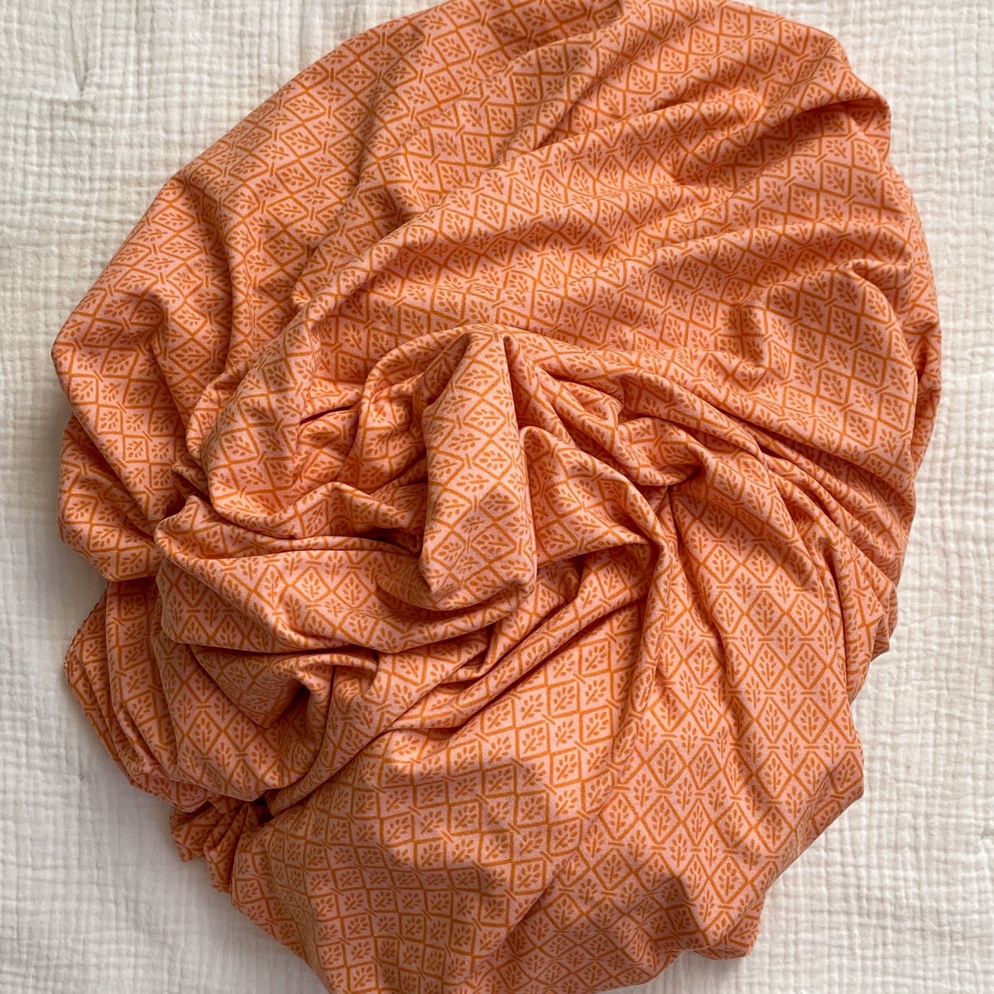 Extra Large Stretch Swaddle | Peach Geometric